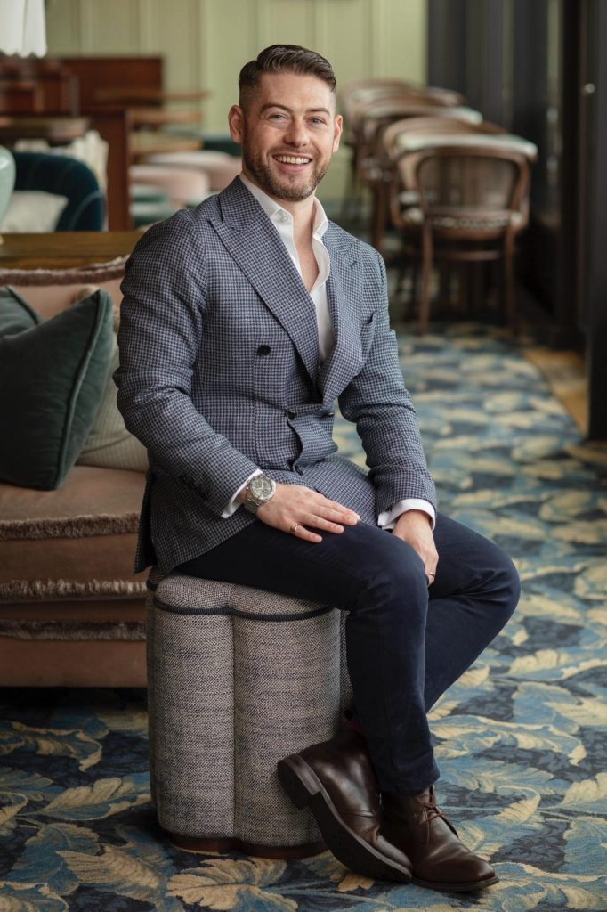 Man sitting in stylish attire